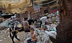 A family at work in the Mokattam area of the Egyptian capital Cairo, where zabaleen collect, separate, sell or reuse rubbish. Photograph: Bernat Armangue/AP